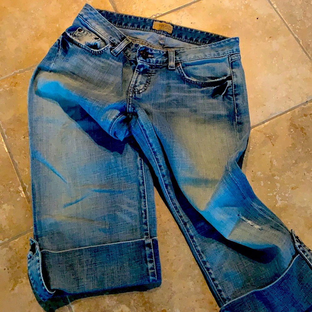 BMK destruction denim cropped cuffed jeans.